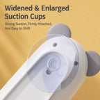 Close-up of widened suction cup on white mouse cat toy against a yellow background